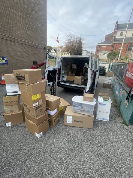 Boxes of donations loaded into transport van
