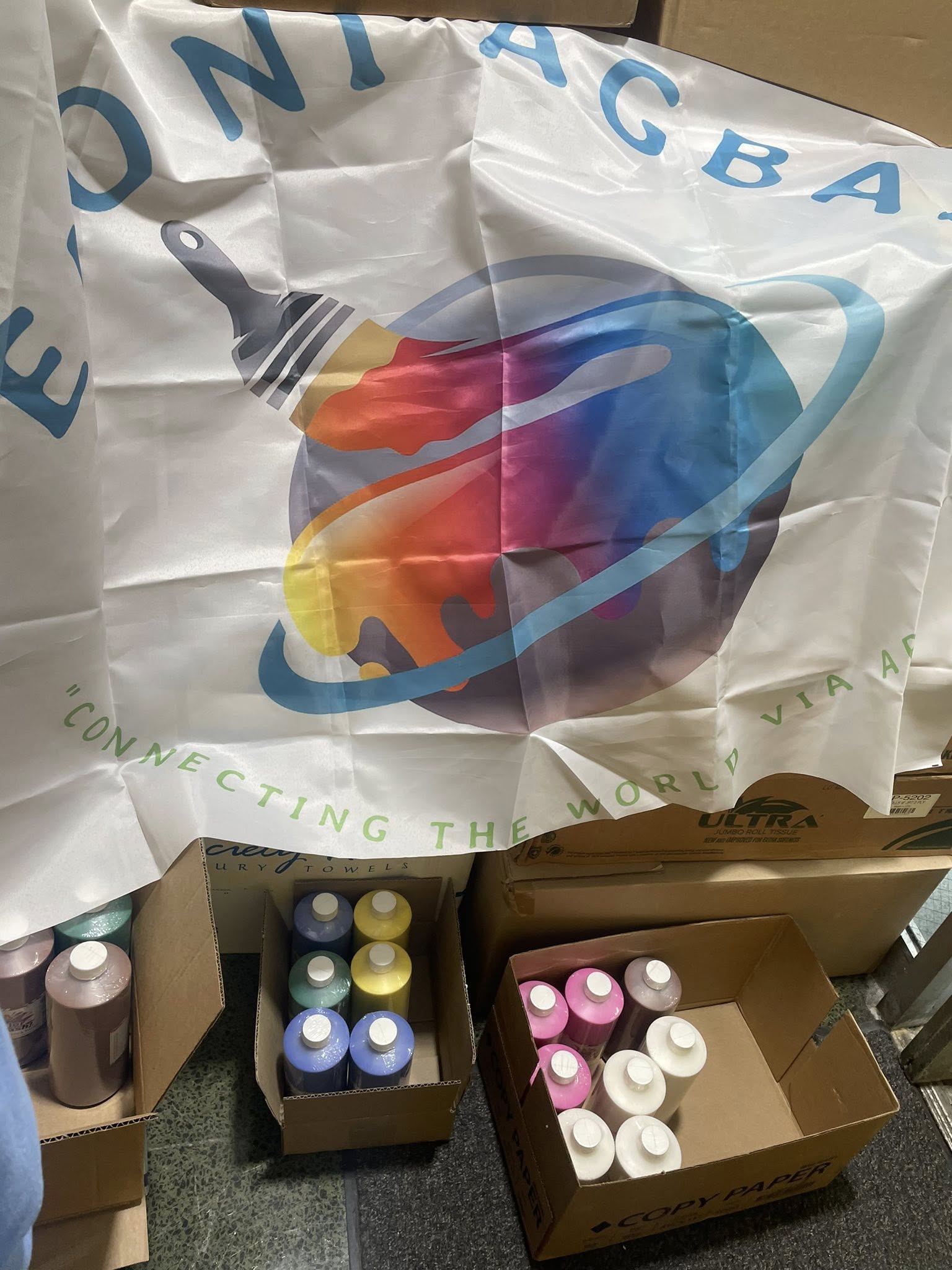 Eko ni Agbara banner with donated art supplies and paint