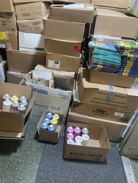 Donated textbooks, art supplies and educational materials ready for shipment
